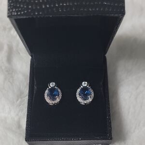 Gold Coast Sterling Silver Topaz and Silver Teardrop Earrings with Gemstone Halo